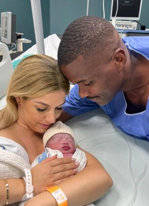 William Carvalho with his partner and baby, Kevin.